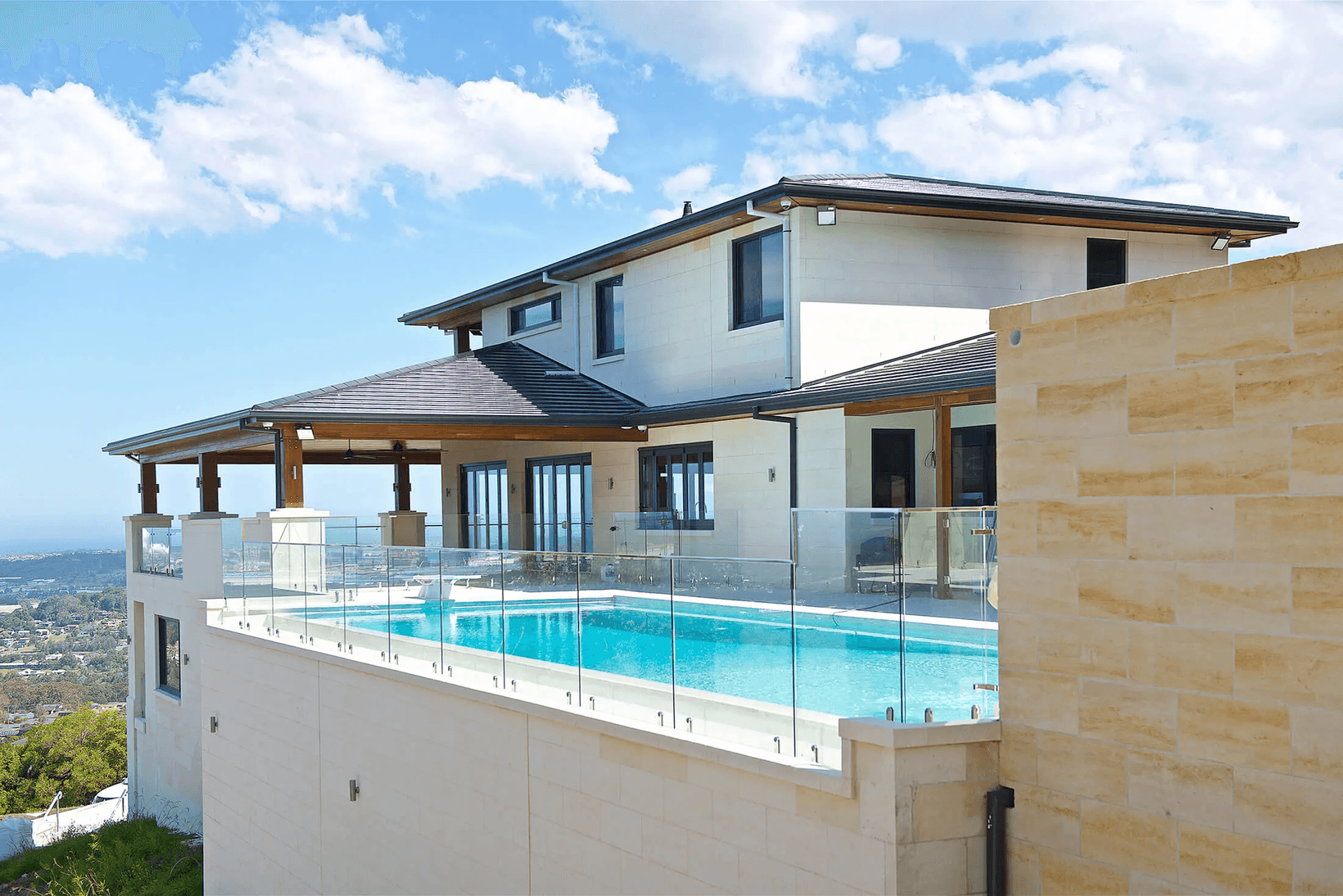 Side shot of Illawarra mansion showing pool