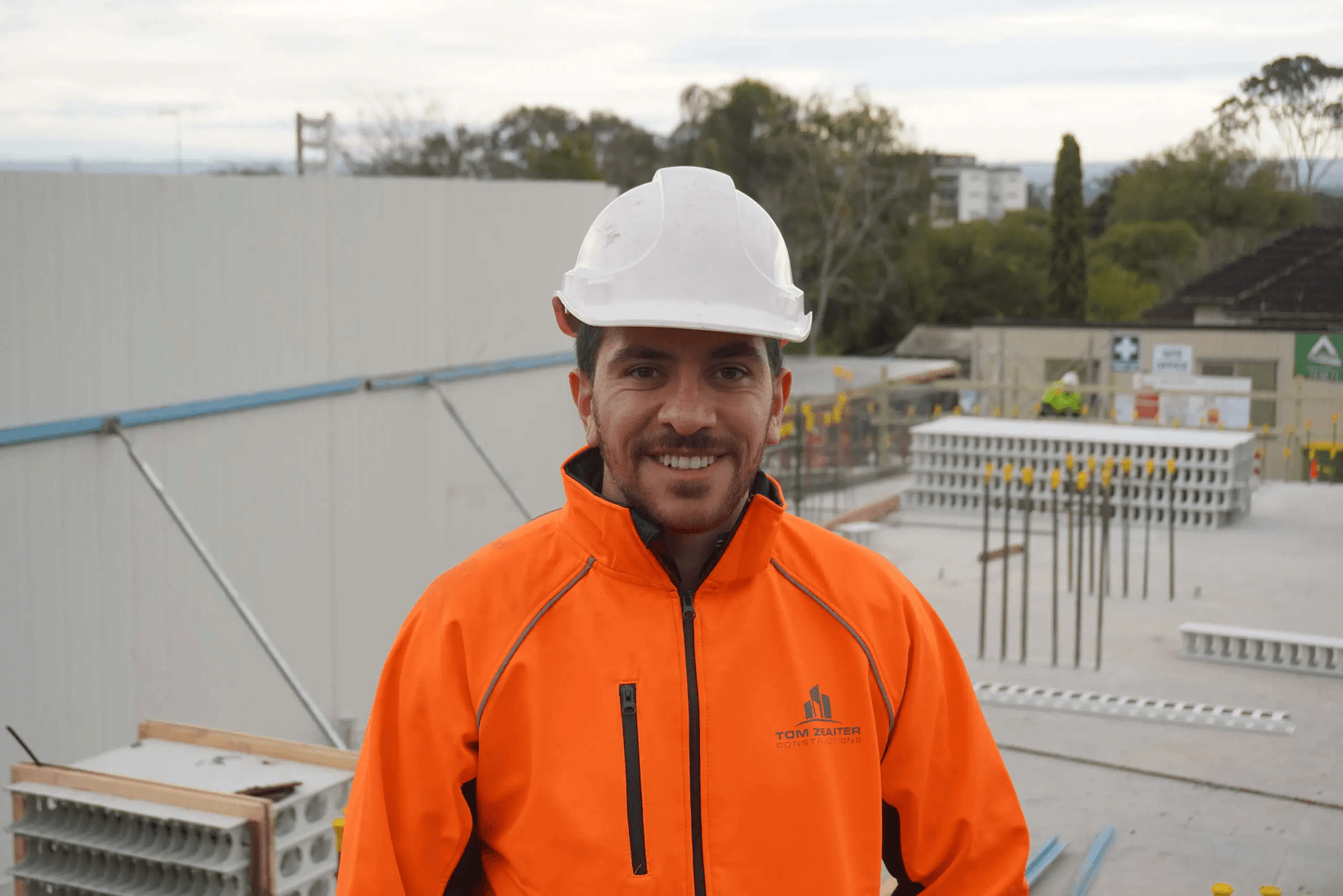Andrew Zeaiter standing in front of Western Sydney project site