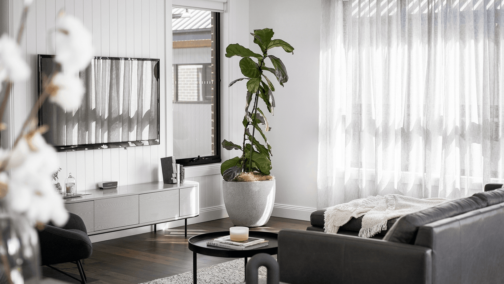 Living area with Cemintel cladding Gilchrist Homes display