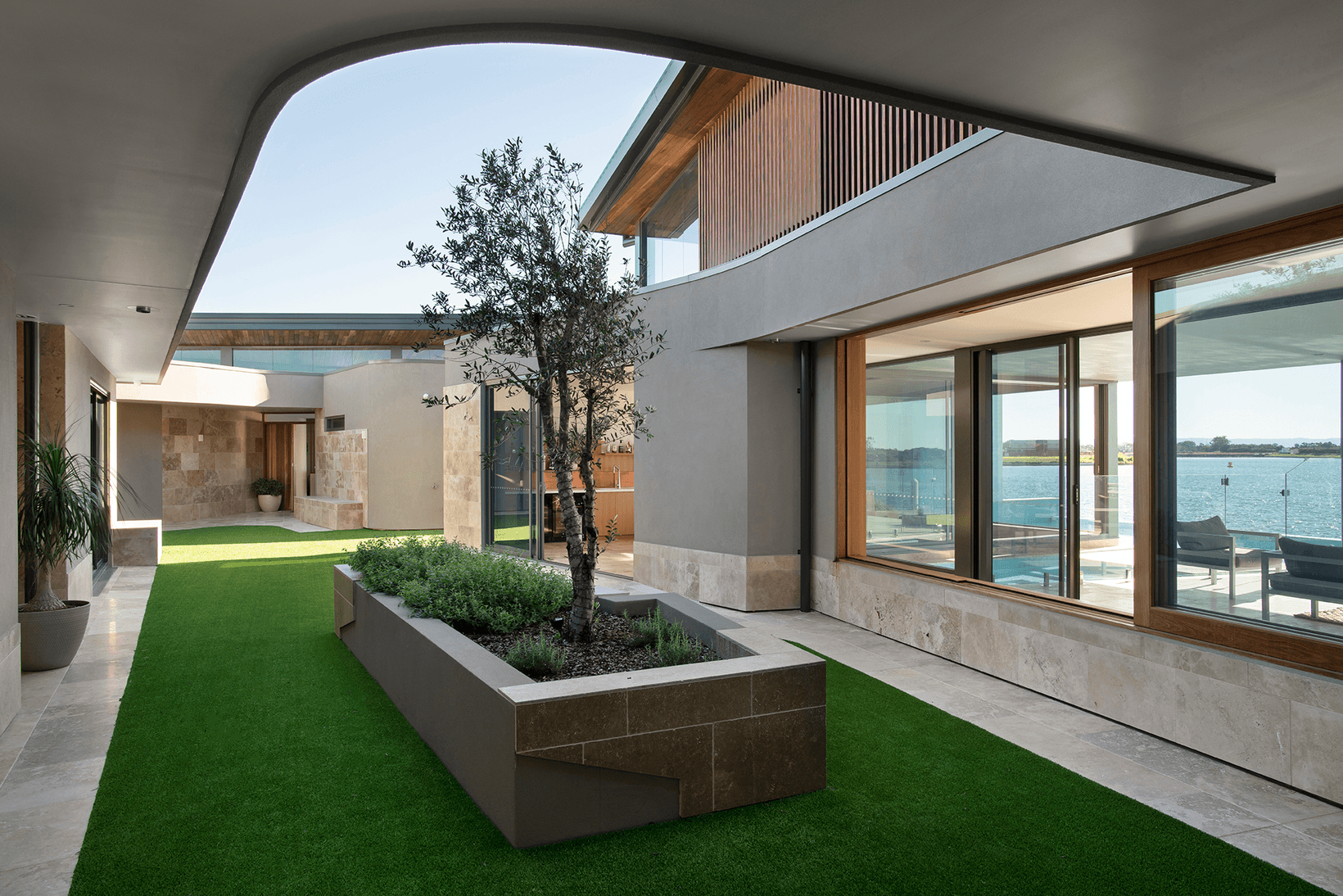 External curved walls made with Hebel showing open air courtyard