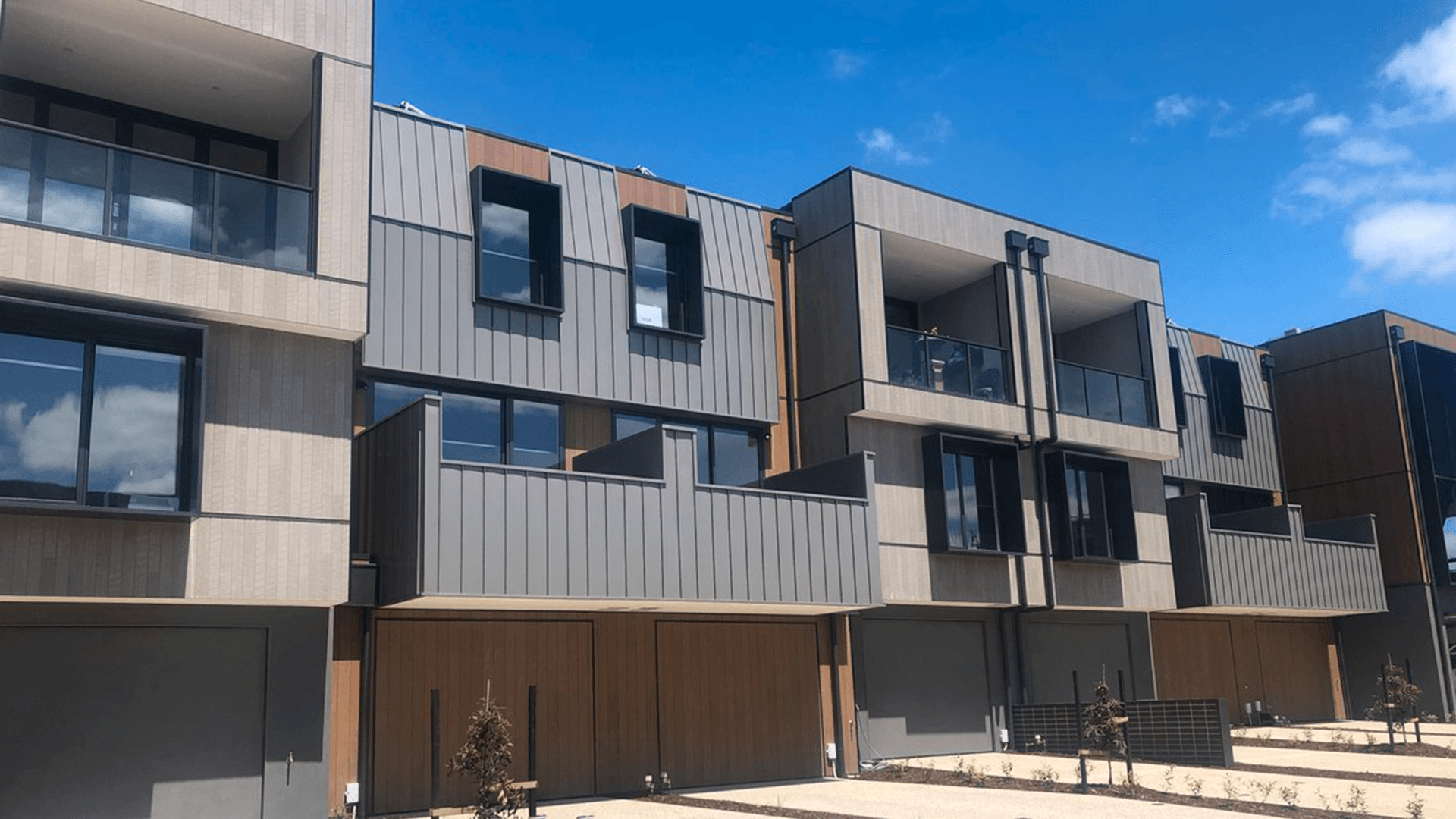 Double storey townhouses with mixed  Cemintel Territory panels