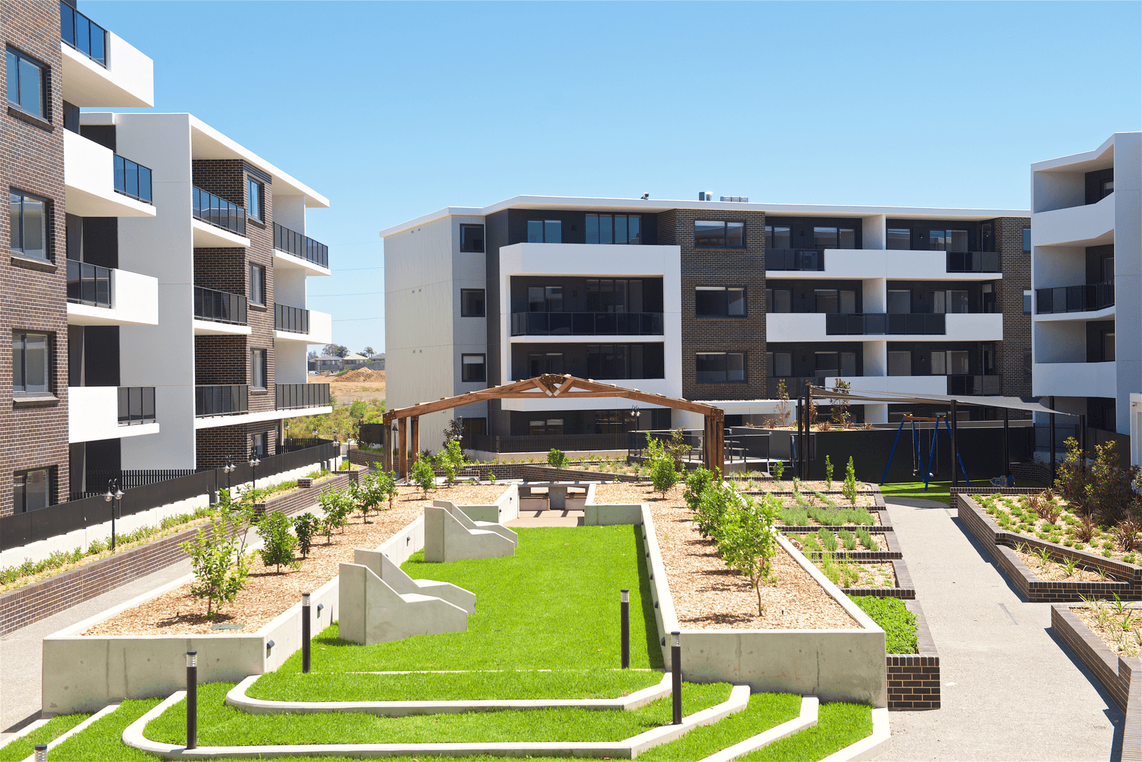Schofields Gardens wide view of the residents open garden area.